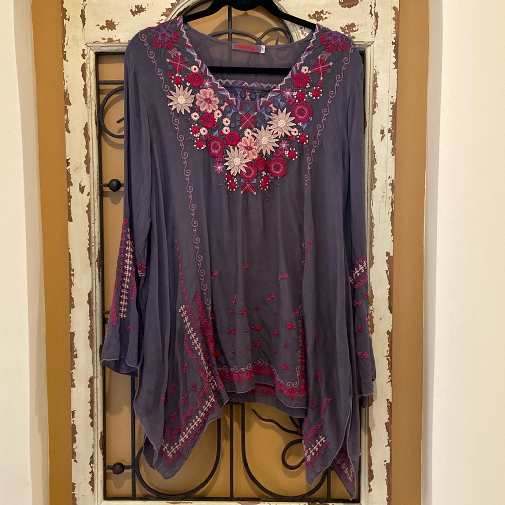 Johnny was gray tunic with flowers
